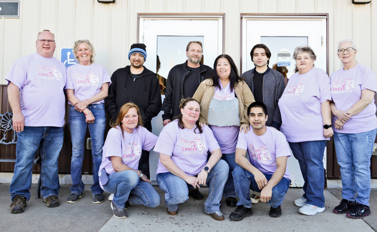 Humm-Dinger employees are shown with their teammate Evelyn Moralez at the “Stronger Than Cancer” Benefit they organized to help her navigate medical expenses as she battles breast cancer. Back row, left to right: Humm-Dinger owner Jason Zacher, Humm-Dinger employee Karin Anderberg, Ronaldo Moralez, Jeremy Stuber, Evelyn Moralez, Ethan Moralez, Humm-Dinger employees Gerri Bader and Dottie Poncelet. Front row, left to right: Tina West, Ellen Tobin, Kevin Phanthavong.