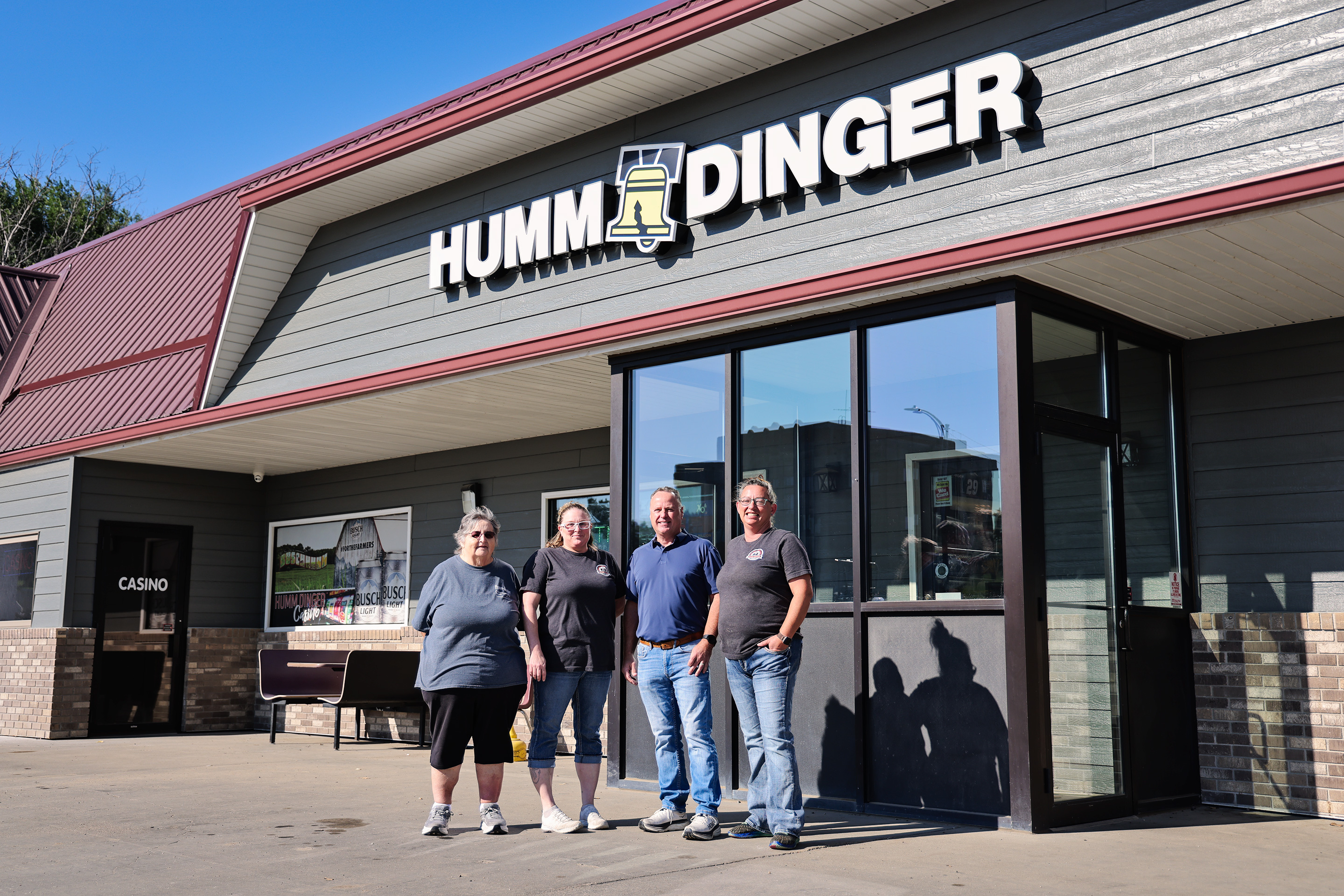 New Humm Dinger owner Cory Zacher, second from right, stands with members of the staff he credits with helping make his decision to purchase the Wessington Springs convenience store following the death of his brother, Jason. Pictured from left are Gerri Bader, Ellen Tobin, Zacher and Juli Jacobs. (KRISTI HINE / TRUE DAKOTAN)
