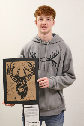 JD Thompson with “The Big One,” 2nd place in Print making division. 