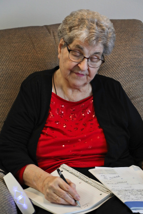 With her calendar nearby and notepad in hand, Dar Cuppy works on another edition of “Cuppy’s Corner” in this January 2024 photo. For more than five decades, she faithfully chronicled the people, places and everyday moments that made the Wessington Springs community special. (TRUE DAKOTAN FILE PHOTO)