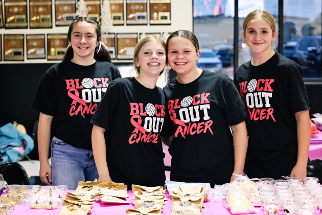 Olive Black, Kora Klusman, Kennidee Kunze and Kenley Walters help with the bake sale.