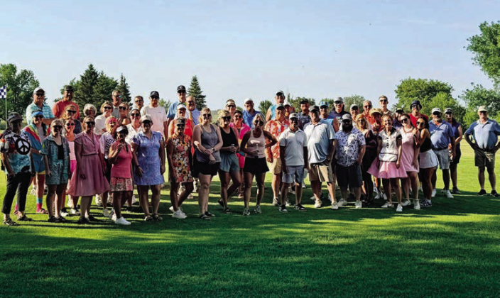 Golfers gather before teeing off at the Donna Rae Memorial 9-Hole Best Ball Tournament on July 17 at the Springs Country Club. The annual fundraiser raised more than $1,000 for an addition to the club's new cart shed, including storage space for the Wessington Springs Spartan golf team, while honoring the memory of Donna Rae and her legacy of giving back to the community. (PHOTO COURTESY REGINA TEVELDAL)