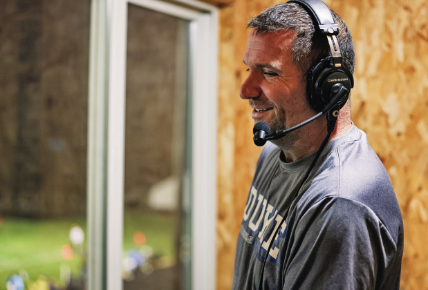 BEHIND THE MIC — Marcus Damm calls the action from the crow’s nest at Spartan Stadium during Wessington Springs’ Homecoming game Sept. 25. Damm was behind the mic as the WWSSC Bucks shut out Miller/Highmore-Harrold 32-0. (KRISTI HINE / TRUE DAKOTAN)