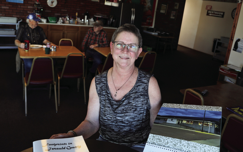 Carla Niemeyer is shown above at the Springs Inn Cafe which she owns and operates with husband Jon. Since last October, she’s been posting photos on the restaurant’s Facebook page that feature Jerauld County-area businesses, service providers and landmarks. Her project has generated a large and lively following locally and across the nation.