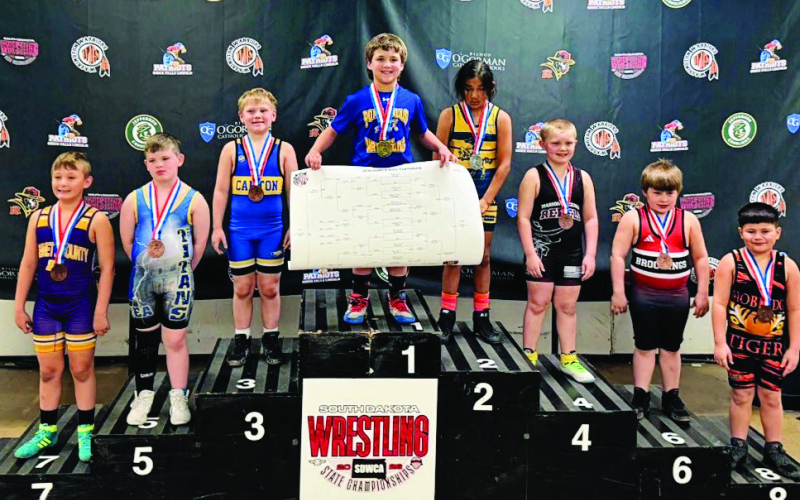 McCrae Nickels stands atop the podium after earning a first-place finish at the AAU state wrestling tournament held at the Sioux Falls Arena March 20-21, 2026. (COURTESY PHOTO)