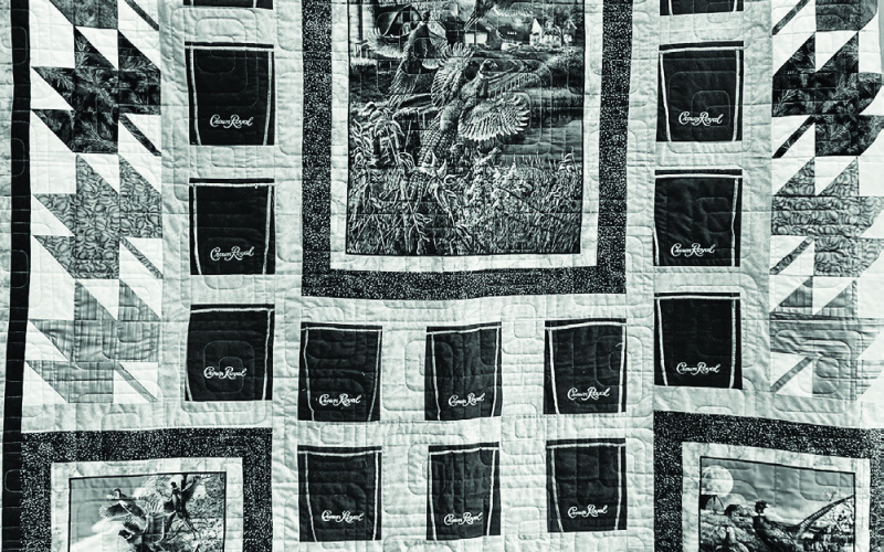 Raffle tickets for the Crown Royal quilt (above) made by Deloris Fuegen and Jean Scheel is currently on display at the Jerauld County Court House. Tickets may be purchased from Jean Ferguson and the winner will be drawn at the Pair of Jacks Golf Tournament to be held at Springs Country Club May 29. All proceeds from the raffle will benefit the Wessington Springs High School golf team.