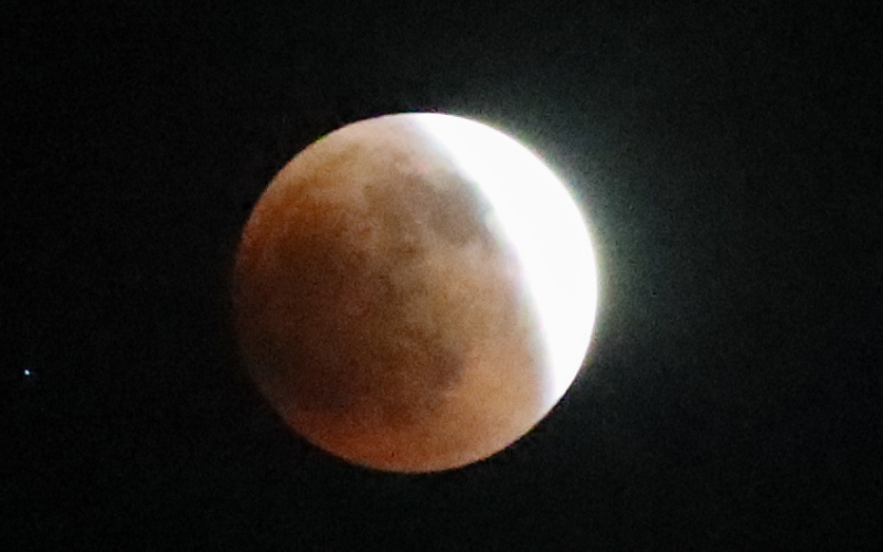 This series of photos shows the moon in various stages of the total lunar eclipse during the first blood moon of the year, in Wessington Springs, SD on May 15, 2022.