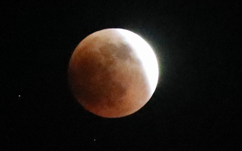 This series of photos shows the moon in various stages of the total lunar eclipse during the first blood moon of the year, in Wessington Springs, SD on May 15, 2022.