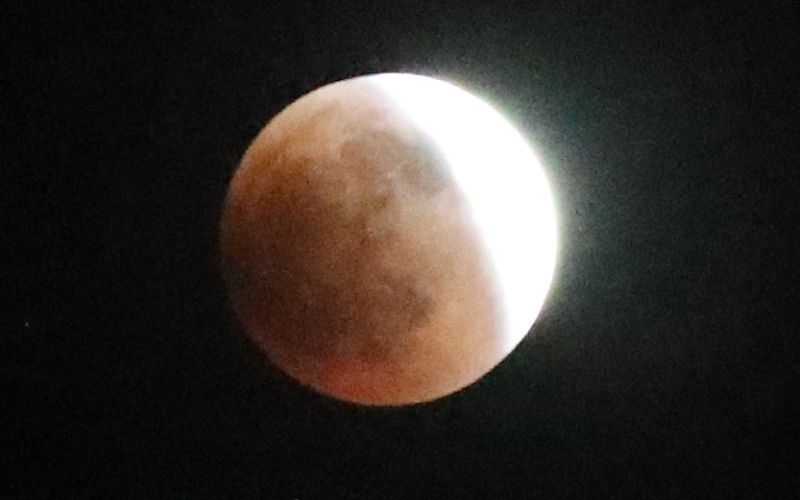 This series of photos shows the moon in various stages of the total lunar eclipse during the first blood moon of the year, in Wessington Springs, SD on May 15, 2022.