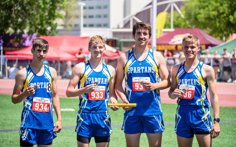 PHOTO BY J. VON EYE IMAGES FOR THE TRUE DAKOTAN The boys 3200m relay ran a season PR crossing the finish line in 8:42.47 to capture the 8th place medal. Members of the 8th place squad were (left to right) Sam Poncelow, AJ Neely, Mason Schelske and Porter Walz.