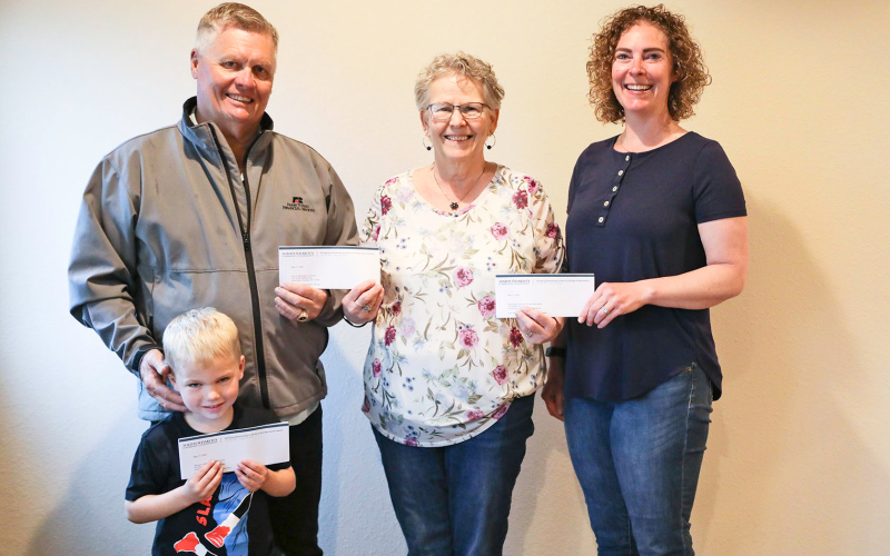 Shown left to right are: Brian Bergeleen and Kactus Coleman on behalf of the City of Wessington Springs and Opera House, WSACF board member Laura Kieser and Rebecca Heumiller on behalf of the Wessington Springs Soccer Association.