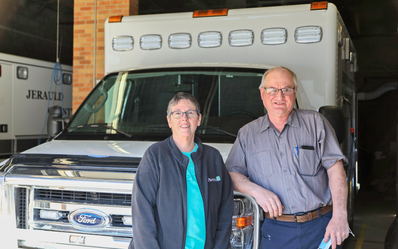 After 37 years on the Jerauld County Ambulance crew, 30 of which he served as ambulance director, Dick (right) and his wife Ellen — who has 24 years with the ambulance service under her belt — have announced that it is time to retire. They are shown in the ambulance garage at Avera Weskota Memorial Hospital in Wessington Springs. KRISTI HINE / TRUE DAKOTAN