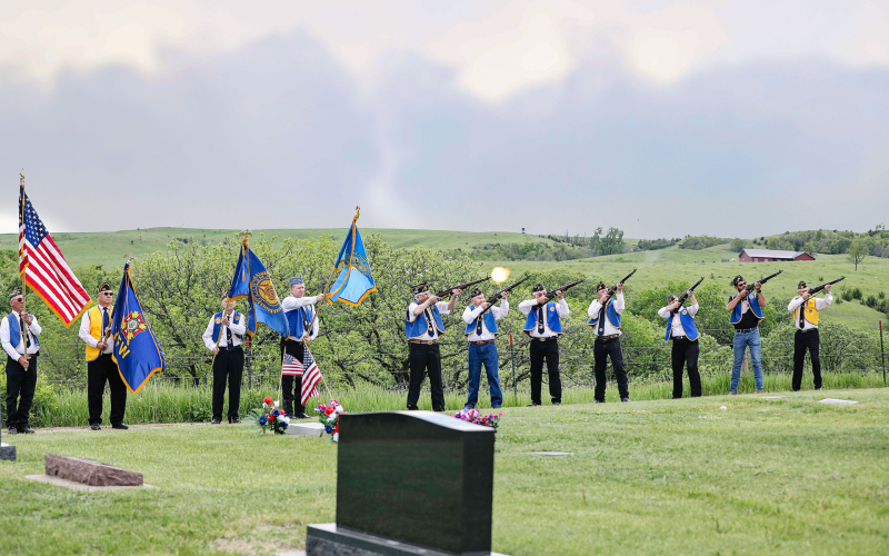 Following a program at rural Hope Cemetery Monday morning, the American Legion Willman-Fee Post 14 served military rites at Prospect Hill as part of the annual Memorial Day program in Wessington Springs. Despite thunder rolling overhead and heavy, dark clouds threatening rain, a large crowd gathered to pay respect, honor and remember.