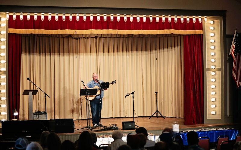 Deach Koch, often dubbed the “John Denver of Gann Valley” infused humor about marriage into his musical performance.