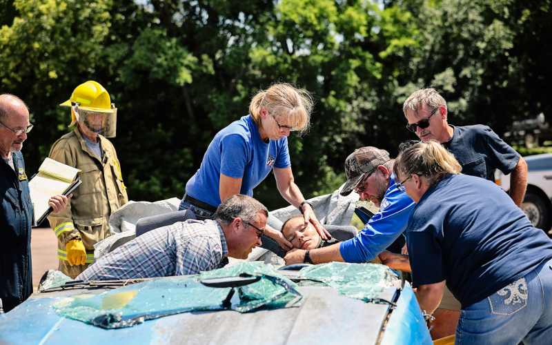 EMTs and firemen from Jerauld County and the surrounding area took part in a day-long training in Wessington Springs Saturday. Trainees are shown practicing a scenario involving a mock auto accident and extrication.