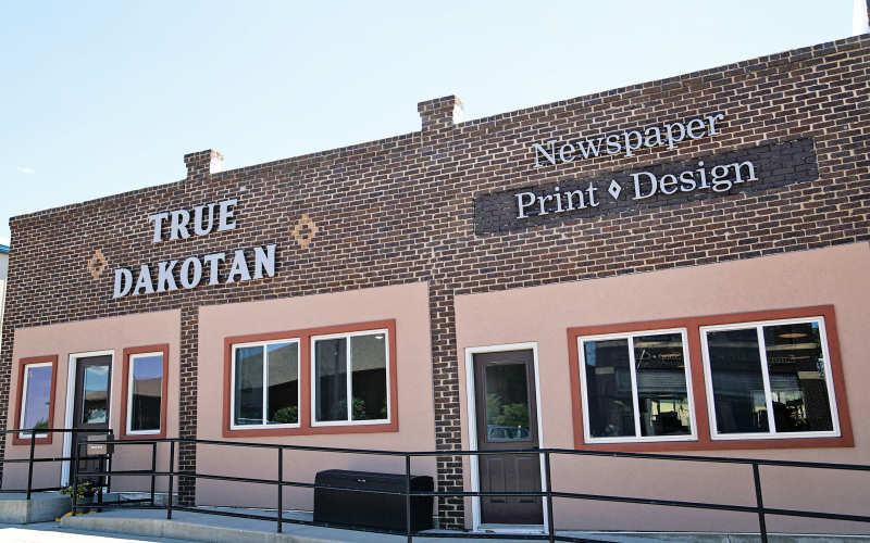 Save-the-day sign installers elevate True Dakotan's new look