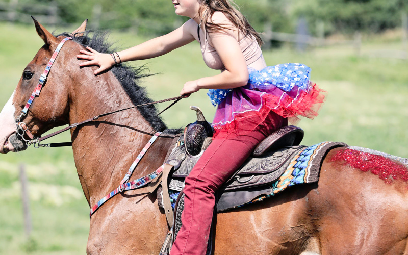 Kaecie Zacher and her horse Dallas showed their patriotic spirit with a star spangled tutu and red, white and blue glitter. She took home 10th (18.986) in the 4D Placings.