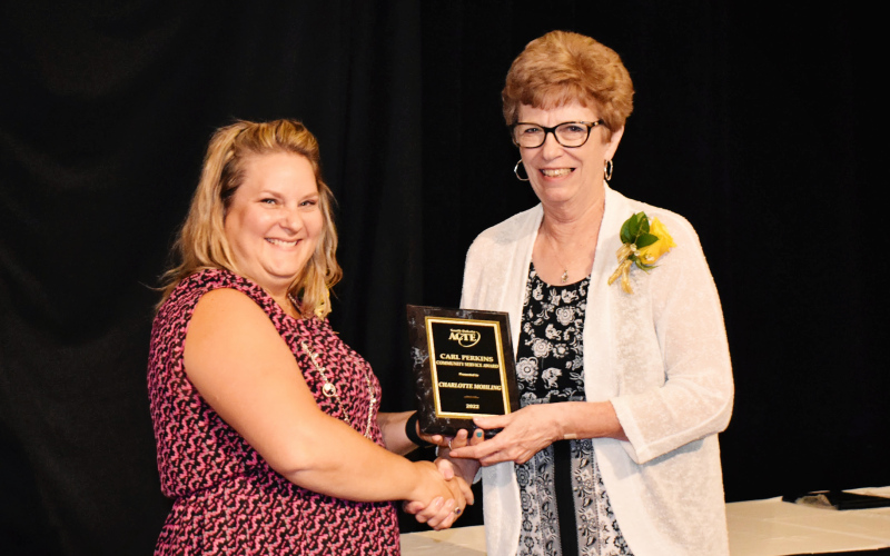Pictured above right is Charlotte Mohling receiving her South Dakota Association of Career and Technical Education Carl Perkins Community Service Award from Bobbie Jo Donovan, President-elect.