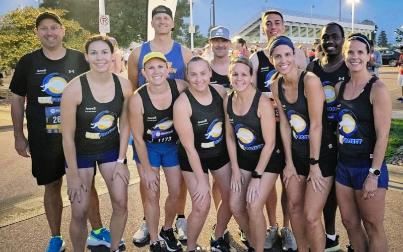 437 Project runners (Left to right): Matt Smith, Whitney Lucas Molitor, Allison Weber, Paul TenHaken, Kristen De Berg, Ryan Flogstad, Lesley Fite-Boltjes, Alex Pool, Wendy Johnson, Benson Langat, Kelly Marshall (missing from the photo is runner Greg Koch).