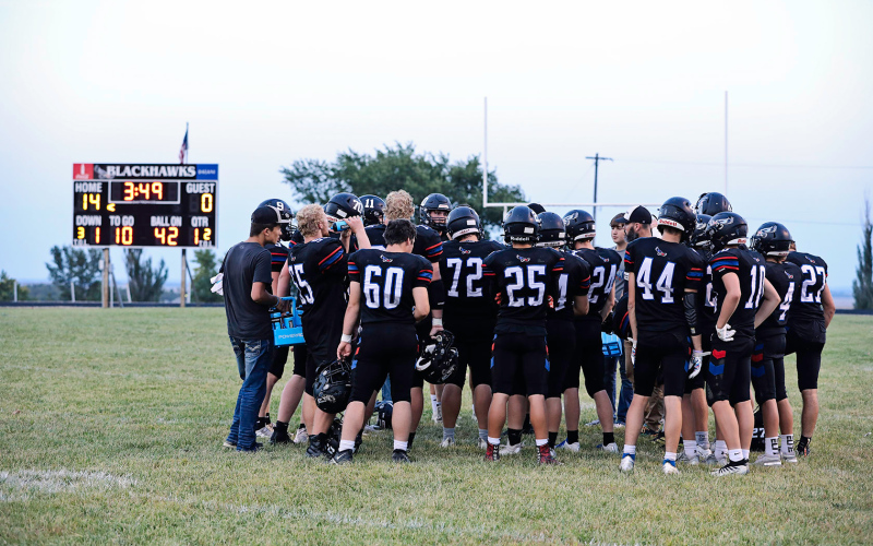 The Blackhawks huddle during the first half of the Rustler shutout.