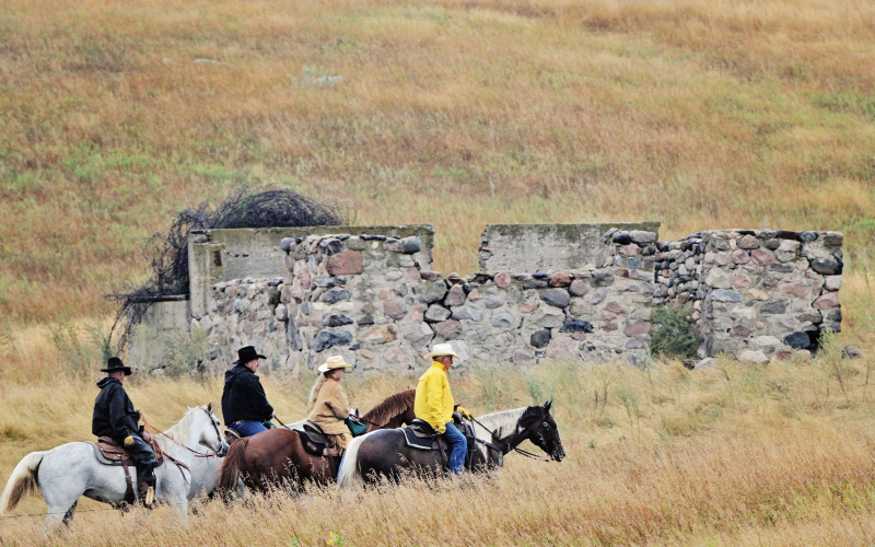 Outriders (left to right) Allen Hinrichs, Cody Fastnacht, Lilliya Meeks and Elton Kaus lead the posse across the Jerauld County prairie on Friday morning. PHOTO COURTESY DARRELL DENEKE.