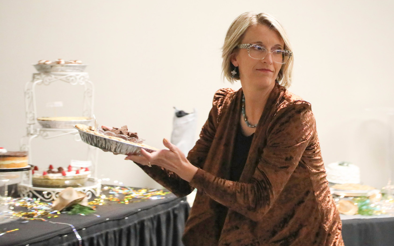 Audra Scheel makes a mad dash during the dessert auction, which is always a lucrative addition to the fundraiser.