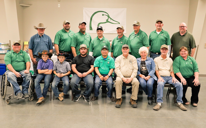 Ducks Unlimited member volunteers are shown front row, left to right: Josh Luckett, Connor Karsky, Parker Karsky, Bailey Willman, Tony Hoarty, Don DeHaan, Esther Walker, Craig Fonder, Dawn Luckett. Back row, left to right: AJ Karsky, Scott Miller, Brian Kolousek, Tom Mebius, Gary Shawd, Greg Robinson, Jeff Haase, Don Thorpe.