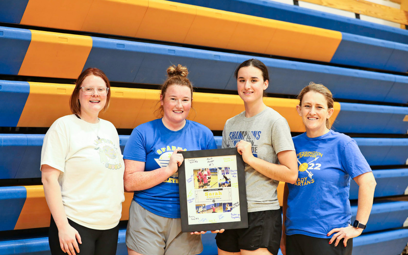 The two senior Lady Spartan volleyball players were honored last week during senior night. Shown at the gym are, left to right: Assistant Coach Kaci Anson, Riley Roduner, Sarah Poncelow and Head Coach Lynn Neely. KRISTI HINE / TRUE DAKOTAN