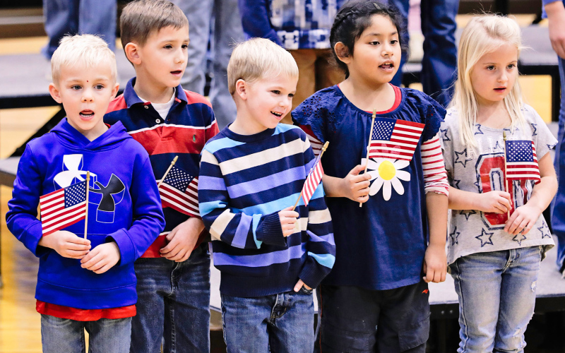 Shown above are members of the kindergarten class who with 1st, 5th and 6th graders sang “Fifty Stars with You’re a Grand Old Flag.” Pictured left to right are: Hayes Schelske, Miles Hasty, Kactus Coleman, Fiby Ciciliano and Amelia Grohs. KRISTI HINE / TRUE DAKOTAN