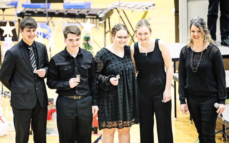 Members of the All-State Quartet from WSHS were recognized at the concert and include, left to right: Blake Miller, Carter Gaikowski, Taylor Braun and Haeleigh Mulder. Director Julie Fastnacht is pictured with the quartet. KRISTI HINE / TRUE DAKOTAN