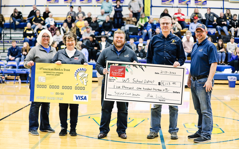 Employees from American Bank &amp; Trust, Wessington Springs branch, presented a check to the school district in the amount of $5,113. The funds will be directed to a locker project at the elementary school.