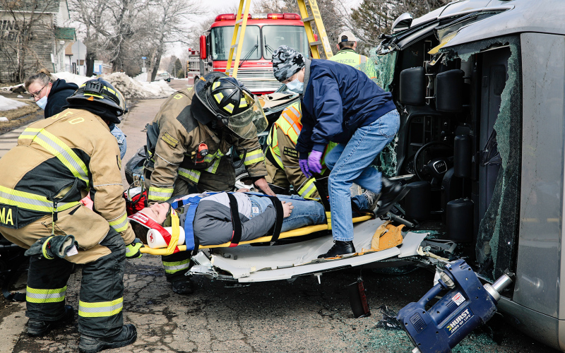 Firefighters from Alpena and Wessington Springs alongside EMTs from Jerauld County Ambulance and first responders from Jerauld County Sheriff’s Office secure and prep a survivor for ambulance transport to the hospital.