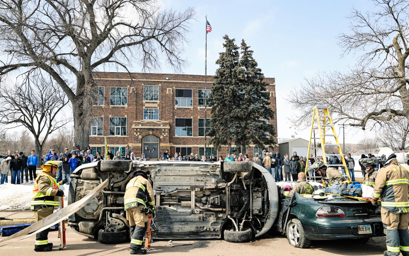 With prom a mere few days away, first responders planned a mock accident for Wessington Springs High School students east of the high school last Friday. The scene served as a stark reminder of the dangers of distracted and drunk driving for students. Students watched as first responders extricated student actor “victims” from the wreckage.