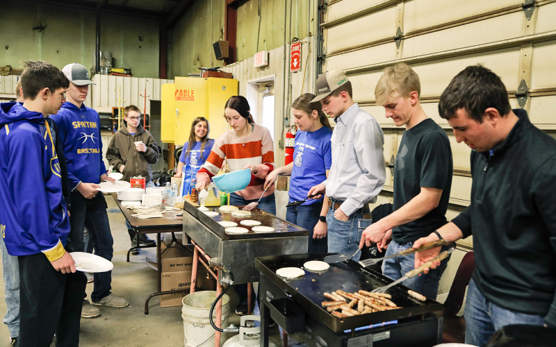 Hundreds of community members, students, school staff and teachers flocked to the vo-ag shop at Wessington Springs High School (WSHS) for “Pancakes in the Shop” Tuesday morning. After dealing with rescheduling multiple events due to weather during last week’s official FFA Week, the Wessington Springs chapter simply showed the resiliency it has always displayed throughout the decades, stepping up to make the best of it and continue on toward success.