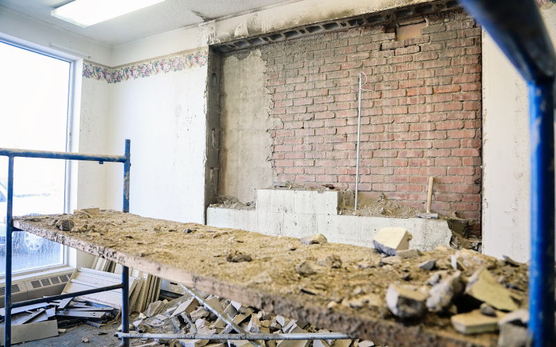 Once the first wall was taken down, the middle brick wall was exposed.