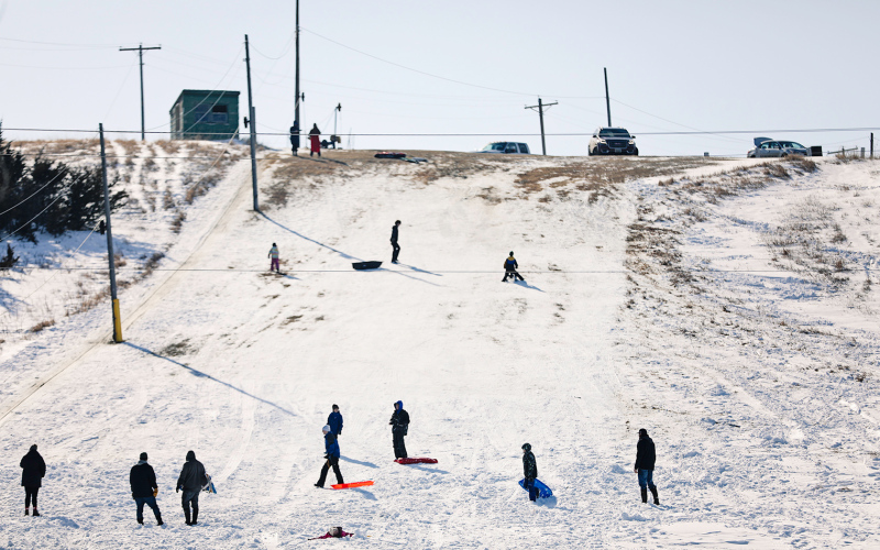Dozens of sledders dotted the ski hill in Wessington Springs Sunday to enjoy fresh snow and mild temps for the last sled of the season February 26.