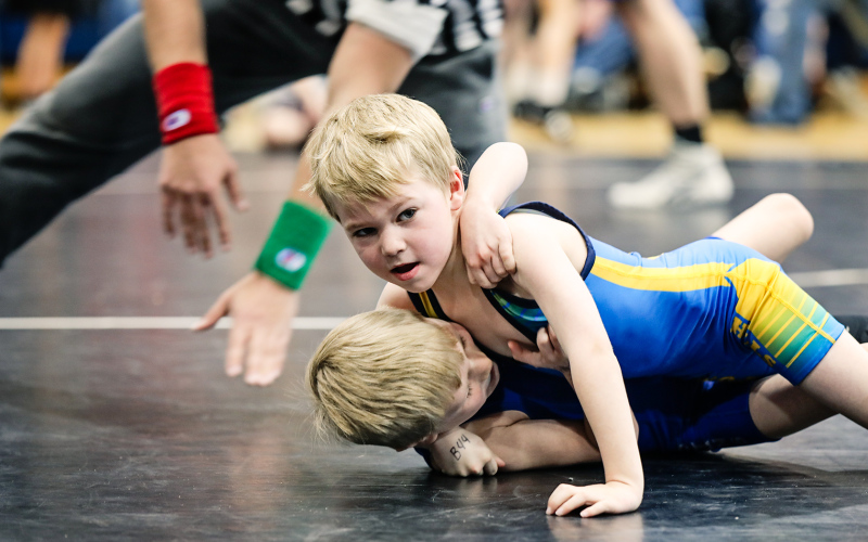 Kactus Coleman looks to his dad Shawn for guidance on his next move.