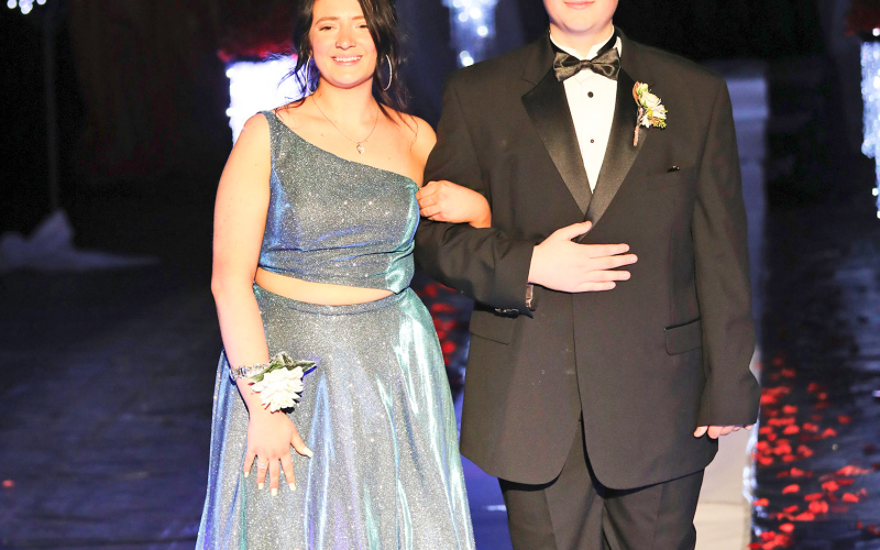Emma Gran is escorted by Grady Gran.