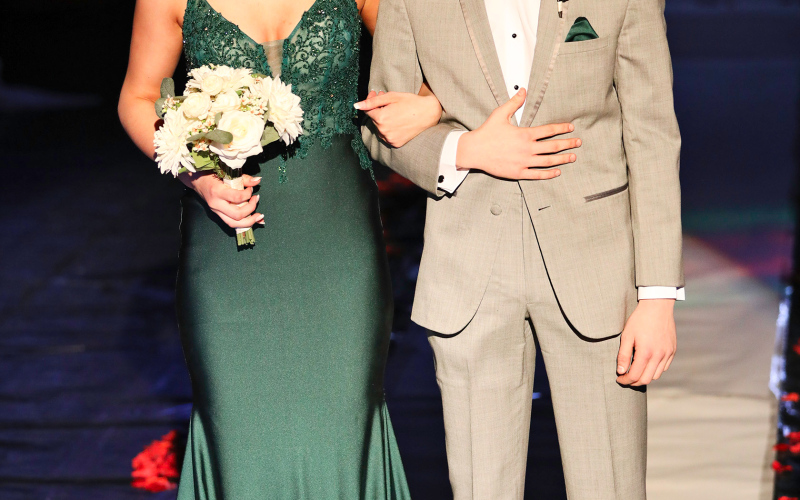 Parker Graff escorts Addyson Orth.