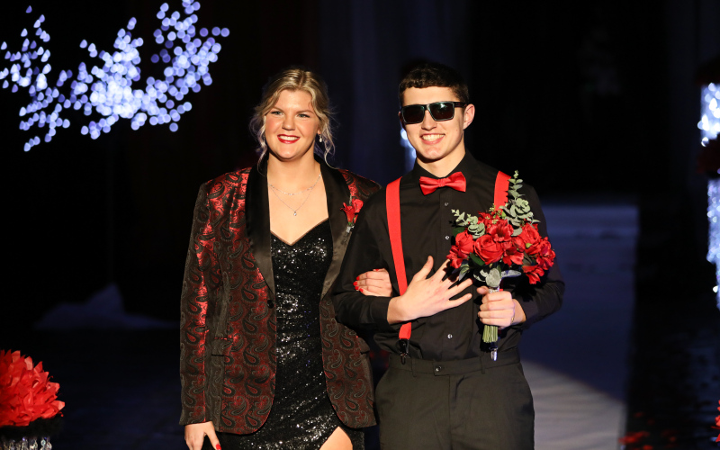 Avery Orth is escorted by Brock Krueger.