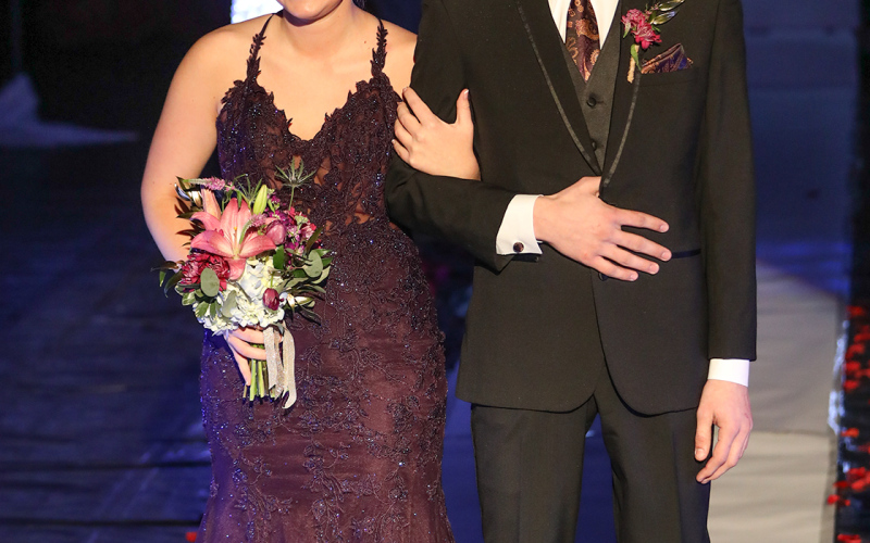 Haeleigh Mulder is escorted by Colton Michael.