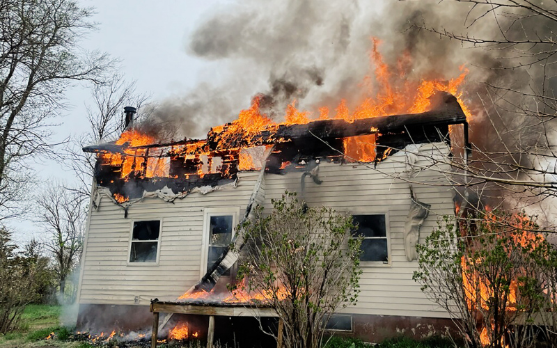 Wessington Springs and Alpena Volunteer Fire Departments with Jerauld County Sheriff’s Office and Jerauld County Ambulance responded to a house fire last Tuesday north of Springs on 221st Street. The Rick and Becky Fjerstad family had recently purchased the home and were planning on moving in next month. PHOTO COURTESY CHRIS SCHIMKE / WSVFD