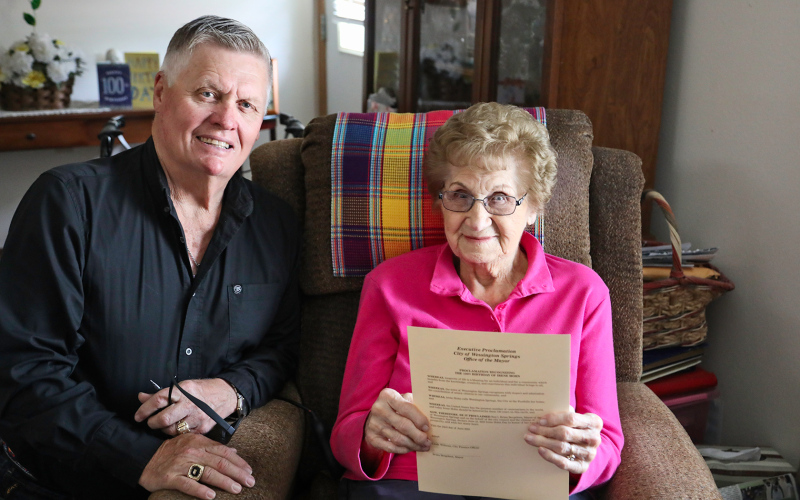 KRISTI HINE / TRUE DAKOTAN Irene Hohn is shown as she is presented with an Executive Proclamation from the City of Wessington Springs by Mayor Brian Bergeleen. The Proclamation recognizes the 100th birthday of Hohn, declaring June 23, 2023 “Irene Hohn Day” on behalf of the city council and citizens of Wessington Springs, in honor of her long life and prosperity.