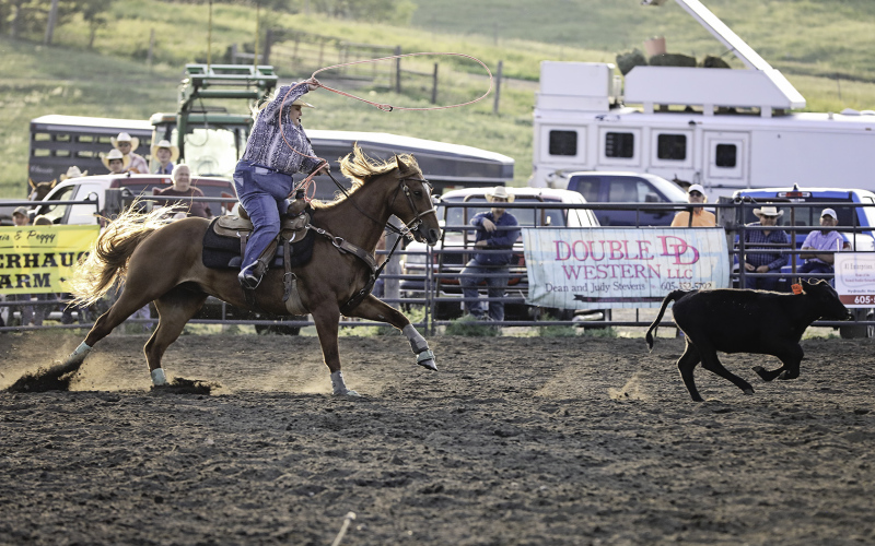 Keah Munsen was another local contestant in the ladies breakaway roping event, taking her turn as the sun began to dip below the Wessington Foothills to the west of the arena. 