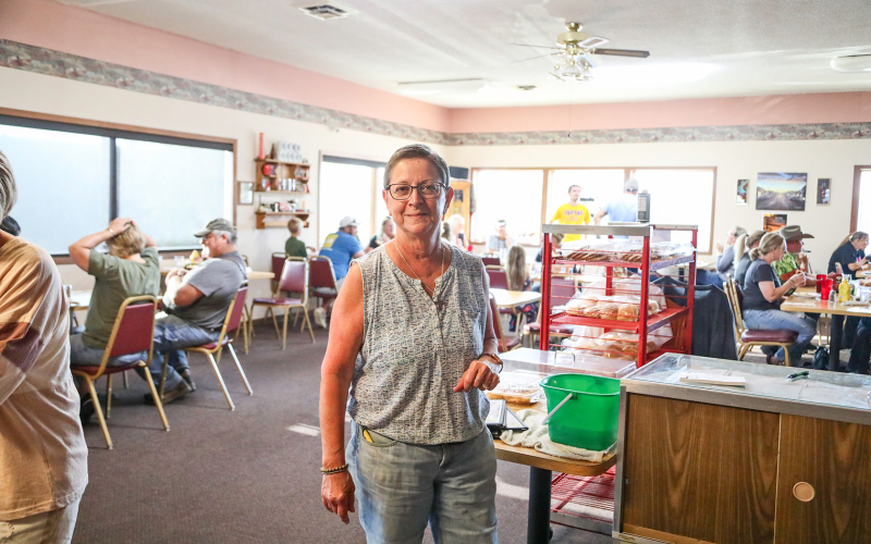 Carla Niemeyer stayed busy throughout the evening with a back-to-school bacon cheeseburger special.