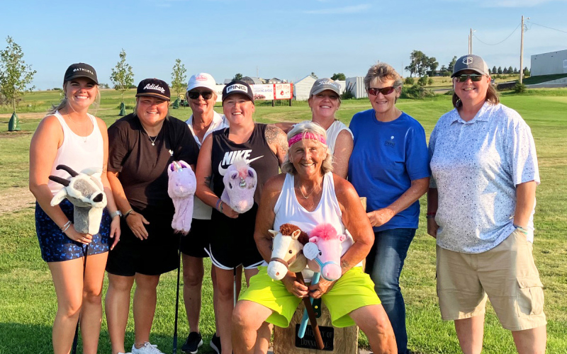 A group of goflers are pictured on Hole 2 at Springs Country Club during the western-themed ladies tournament, the Tumbleweed Open.