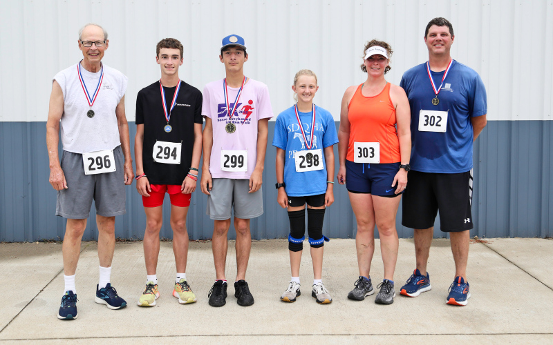 Shown above are the 5k winners in their respective divisions. From left: Gail Arnott, winner ages 51 plus, 35.24; Legend McLean, male winner ages 17 and under, 20.02; Damian McLean, winner ages 18 to 30 and overall winner, 19.58; Alexis Roesler, female winner ages 17 and under, 25.12; Rebecca Heumiller, female winner ages 31 to 50, 31.49; Craig Heumiller, male winner ages 31 to 50, 27.03.