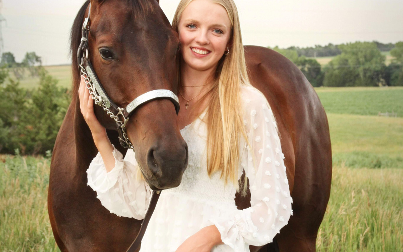 Abby Kolousek, a WSHS senior who is hosting a playday next weekend as part of her senior project, is shown with her horse Diesel. A frequent participant in horse competitions, her favorite event is hunter equitation over fences.