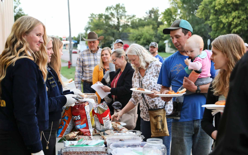 State FFA Officers alongside local chapter members served up a free meal to the community.
