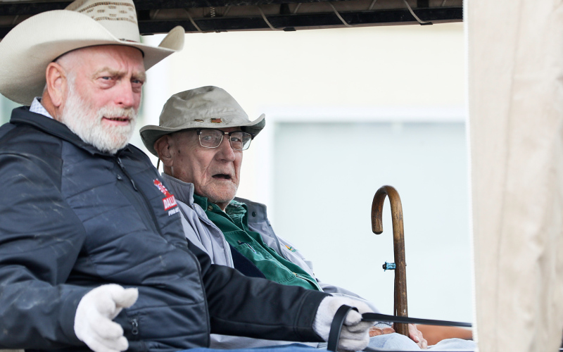 Mayor Brian Bergeleen (not pictured) arranged for a special 95th birthday wagon ride Saturday for Roger Cashman (right). He is shown with Leroy Miller of Dallas, SD who is driving Wessington resident Dick Rodgers’s team.